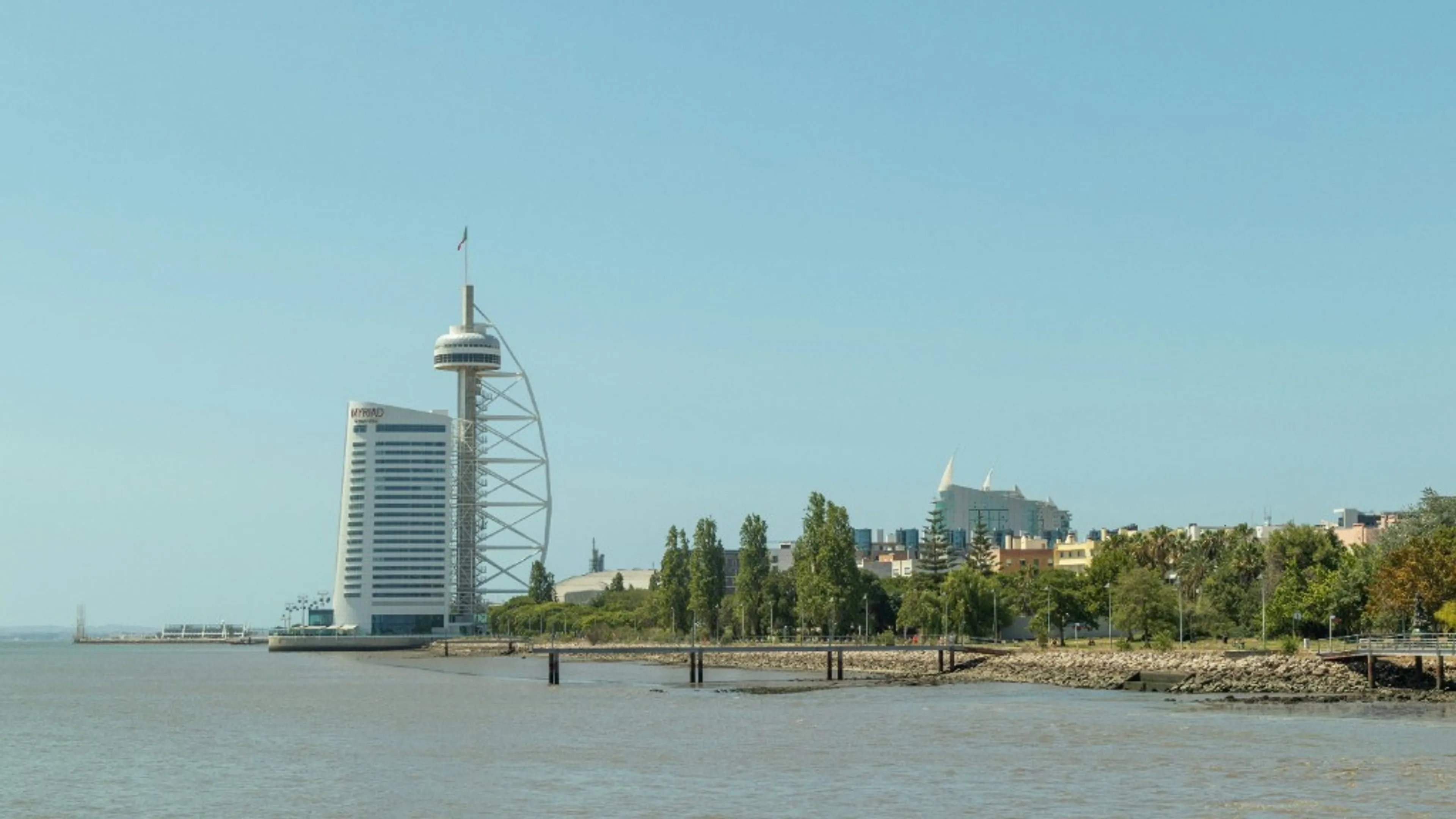 Vasco da Gama Tower and the Myriad by SANA Hotel on the Tagus riverfront in Lisbon, Portugal