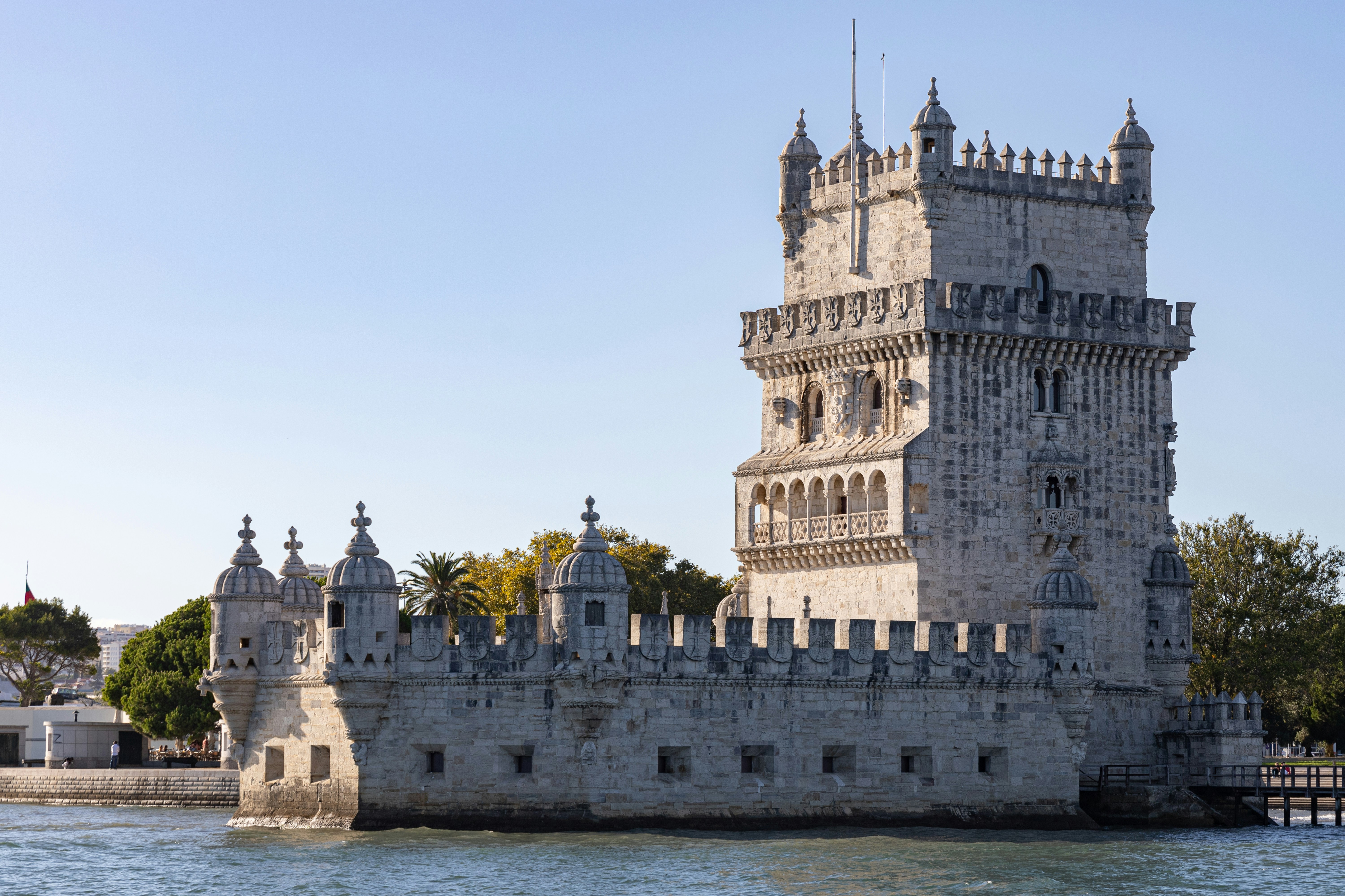 Belém Tower, a limestone riverside fortress in Lisbon, photographed from the water