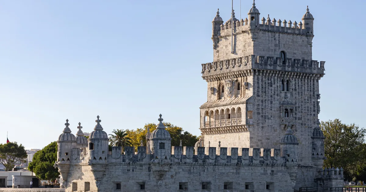 Belém Tower, a limestone riverside fortress in Lisbon, photographed from the water